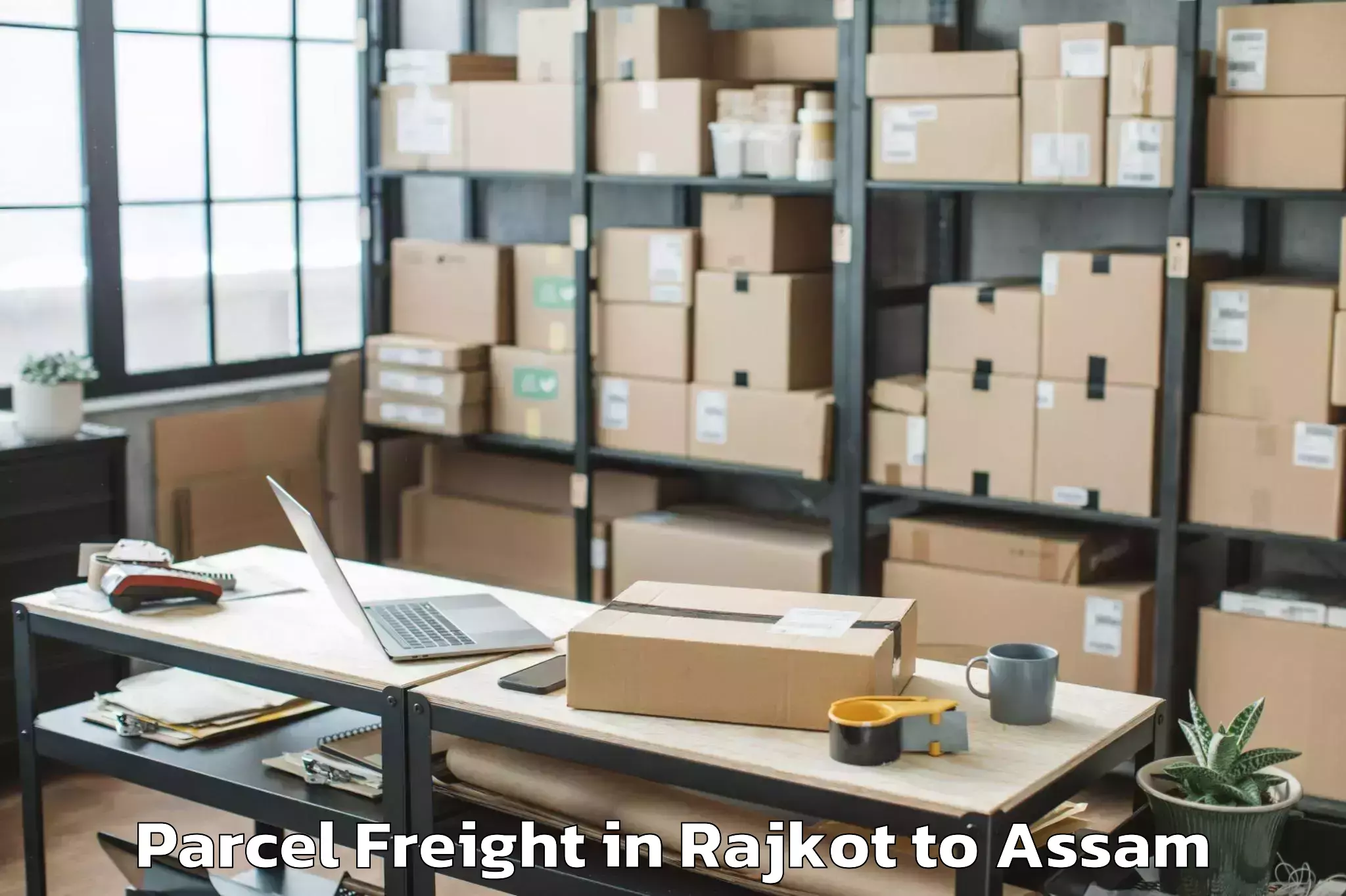 Quality Rajkot to Lakhipur Parcel Freight